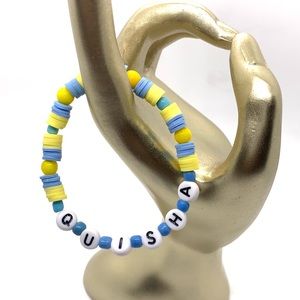 Personalized Clay Beaded Bracelet For The Name “Quisha”